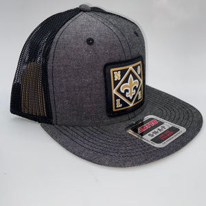 Saints Chambray Black Flatbill Trucker Hat